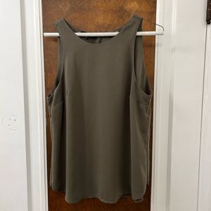 Tank with buttons on back- open back.